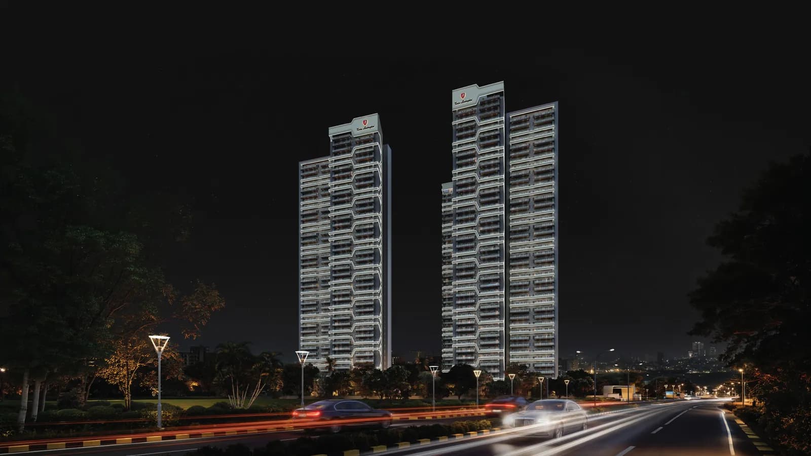 Tonino Lamborghini Residences Gurugram towers by night, artistic impression