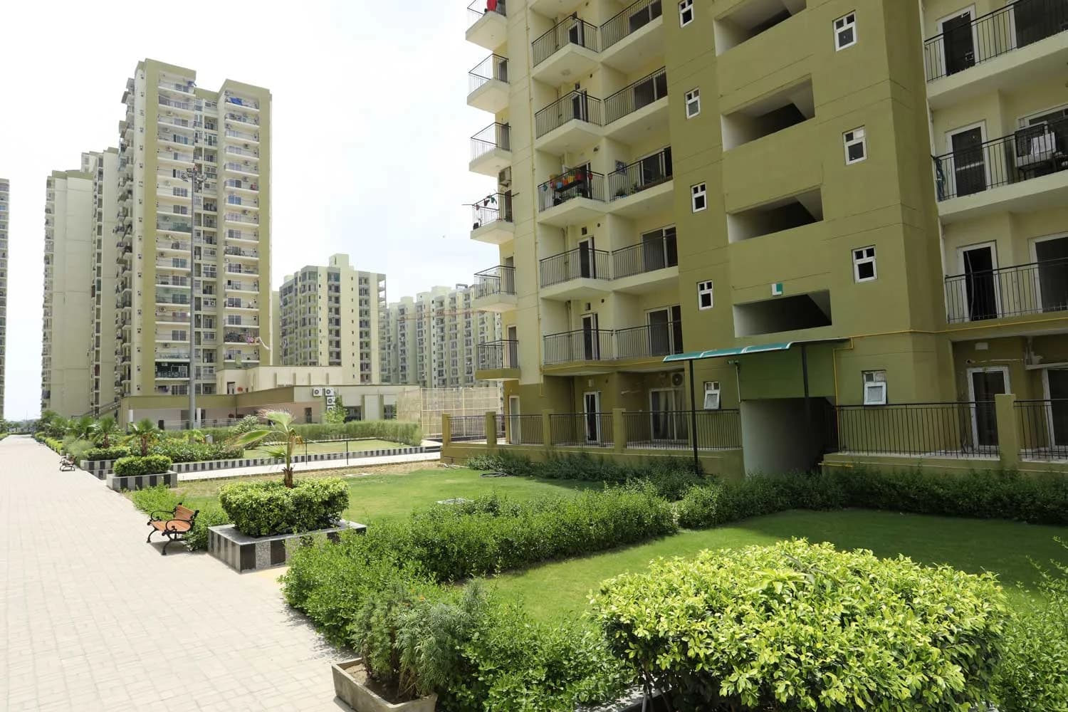 Trident Embassy residential towers and landscaped courtyard, developer-published project photograph