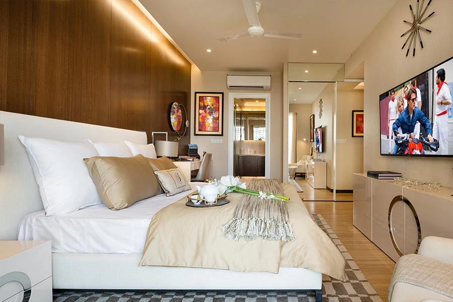 DLF The Skycourt — furnished bedroom reference — Developer gallery photograph of a furnished reference home, not the offered unit. Furniture, appliances and finishes are not included unless agreed.