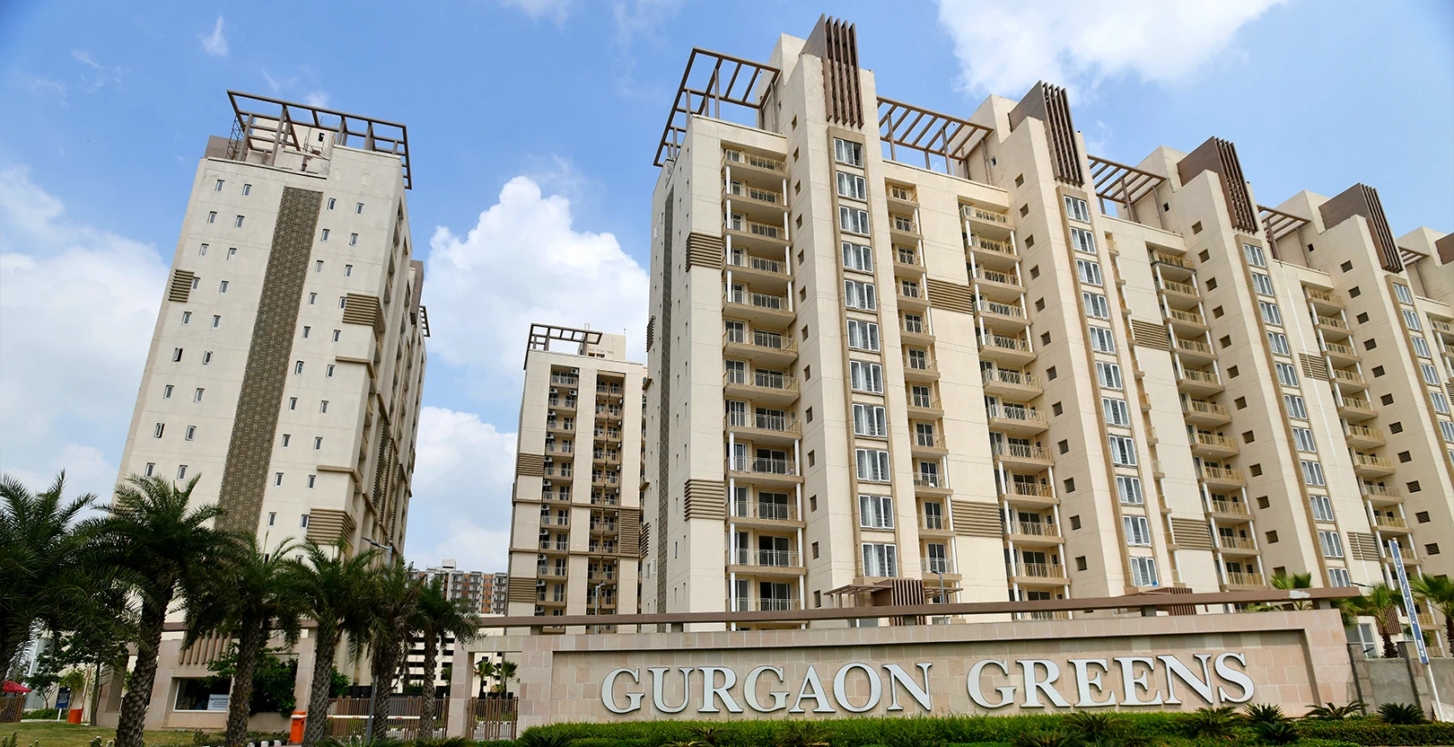 Emaar Gurgaon Greens — named project entrance and towers — Developer project photograph/reference; not the offered unit. Current condition and access rights must be confirmed.