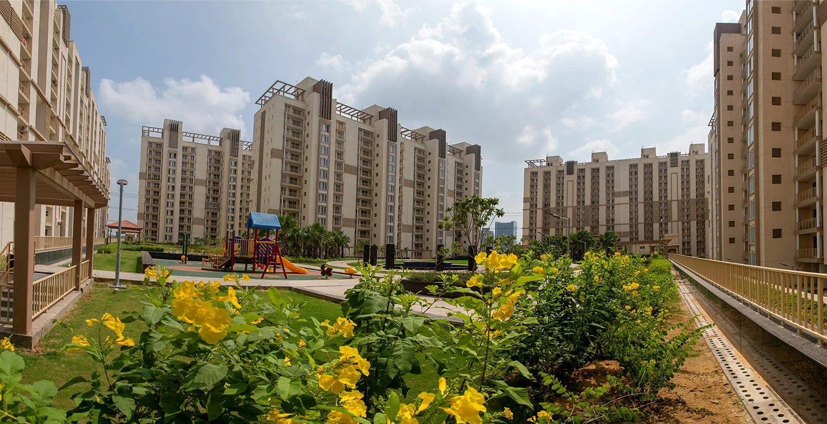 Emaar Gurgaon Greens — landscaped residential courtyard — Developer project photograph/reference; not the offered unit. Current condition and access rights must be confirmed.