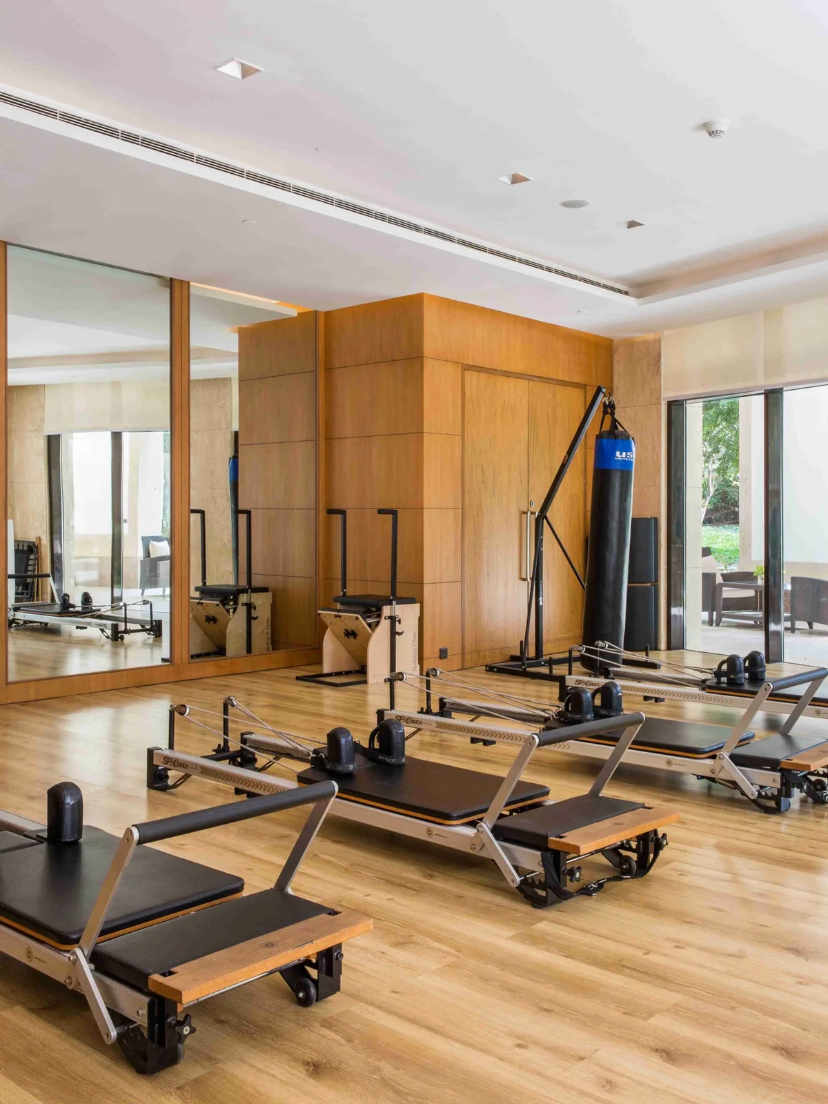 DLF The Magnolias — Pilates studio — DLF Hospitality club photograph; membership and access terms apply. Not the offered residence.