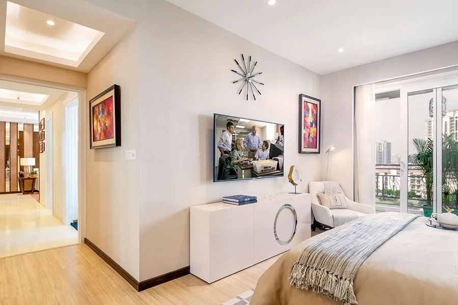 DLF The Skycourt — show-home bedroom — Developer show-home photograph; furnishings and finishes are not the offered unit's specification.