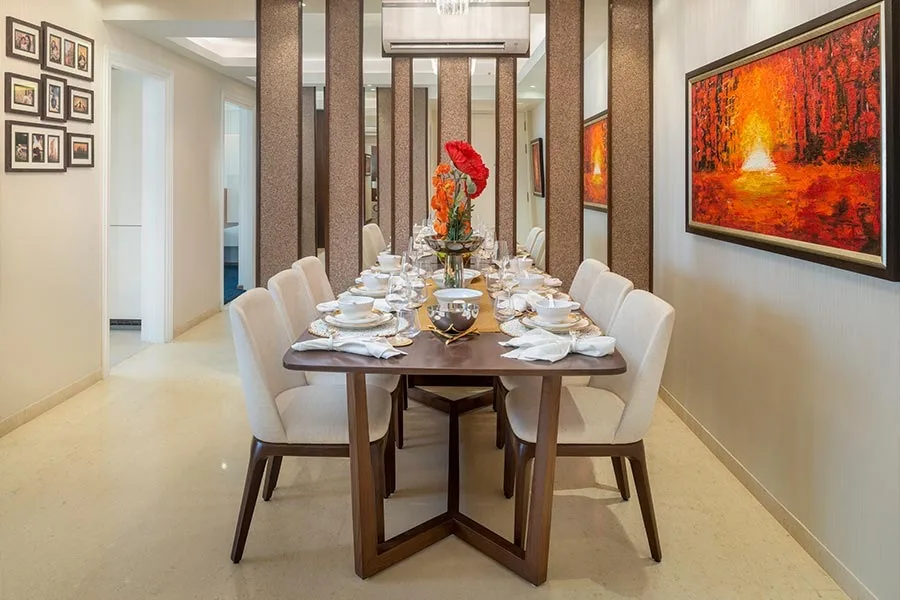 DLF The Skycourt — show-home dining room — Developer show-home photograph; furnishings and finishes are not the offered unit's specification.